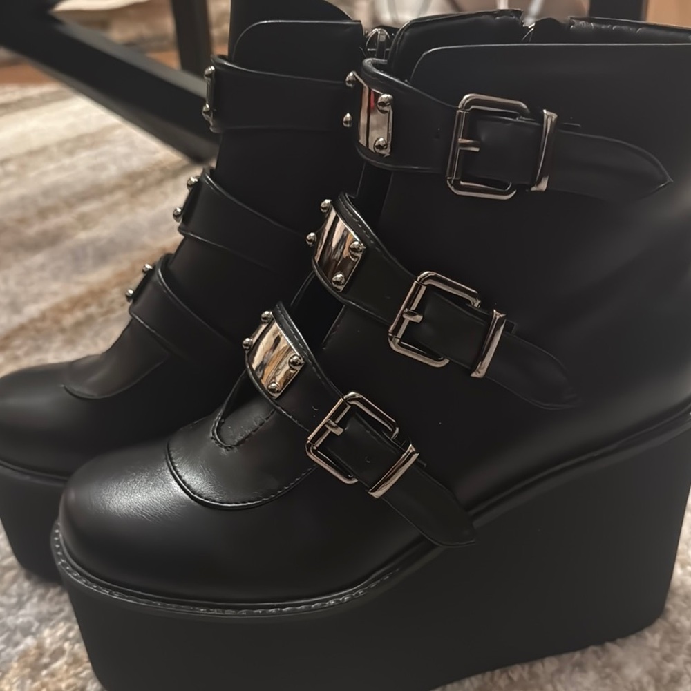 Stylish Black Platform Boots with Silver Buckles